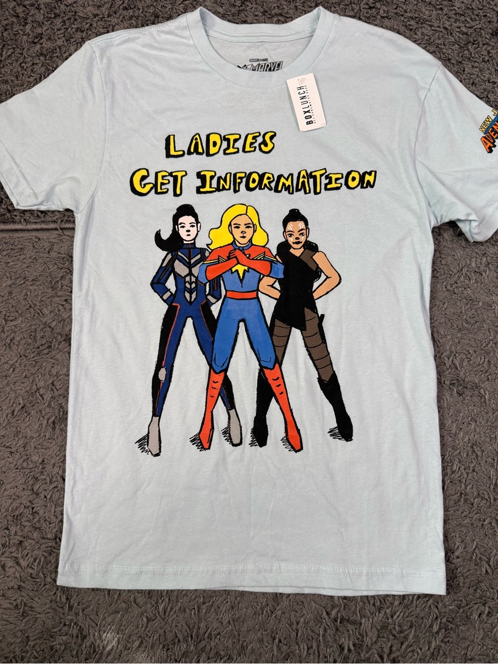 Marvel Studios Ms Marvel “Ladies Get Information” Graphic Tee - Light Blue.